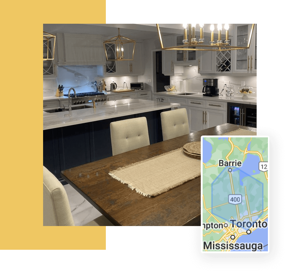 A kitchen with a table and chairs, and a map of toronto.